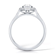 Oval Cut Diamond Ring In A Rubover Grainset Halo Design